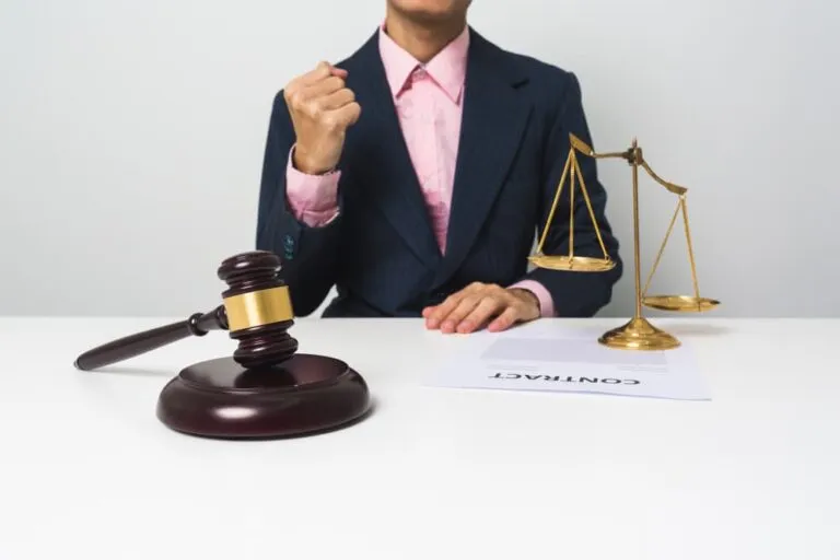 Young attorney celebrates with joy following a victorious outcome in a legal case.