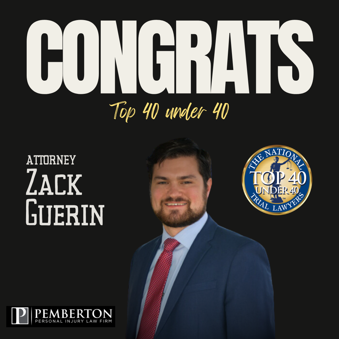 Attorney Zack Guerin is shown receiving recognition as a top 40 under 40 trial lawyer in Wisconsin.