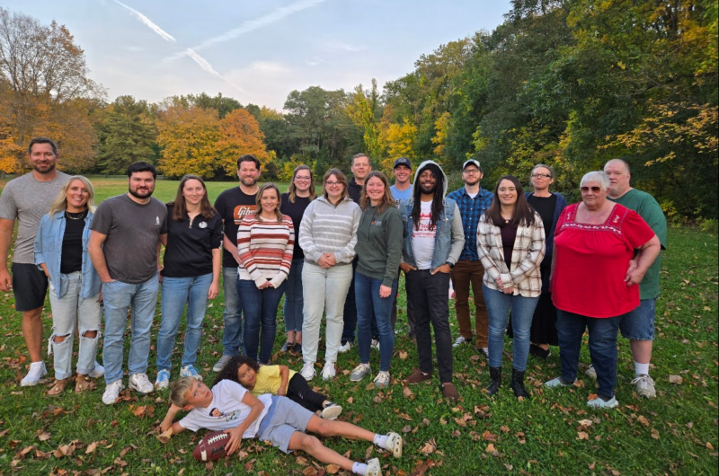 The team at Pemberton Personal Injury Law Firm poses for a photo at Devil's Lake in Wisconsin 