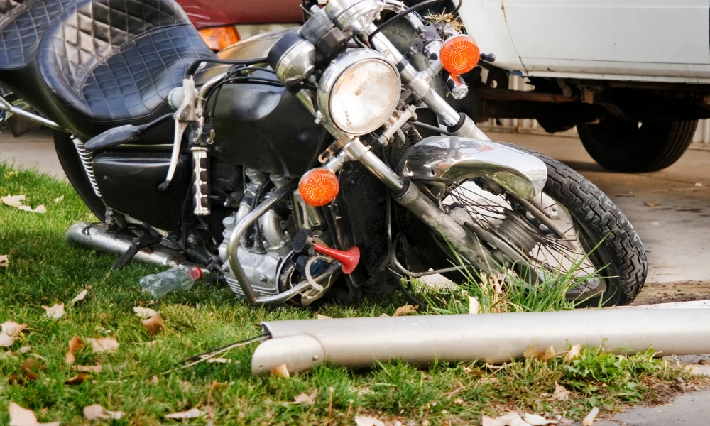 a motorcycle broken down on the side of the road