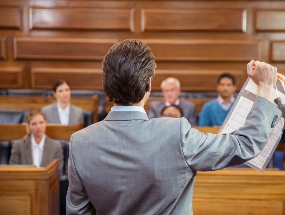 a lawyer presents a document as evidence to a jury