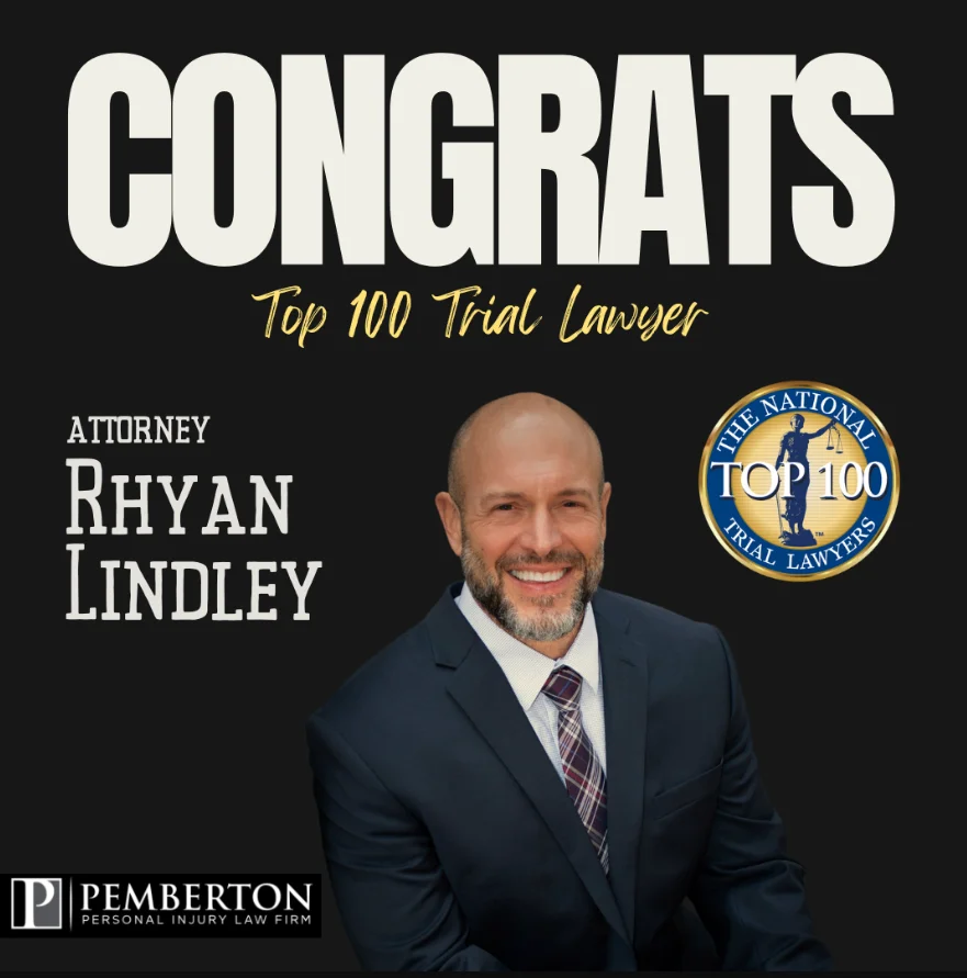 Personal injury plaintiff attorney Rhyan Lindley is recognized as a top trial lawyer in a graphic that includes the National Trial Lawyers symbol