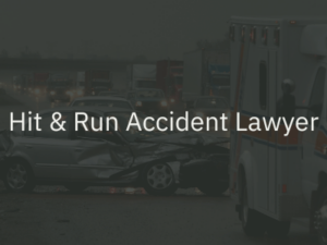 a hit and run accident scene with an ambulance and dented car, 'hit and run accident lawyer' in the foreground