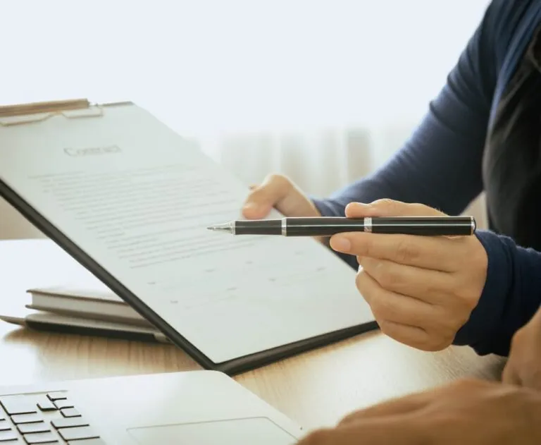 Employees promoting insurance benefits and encouraging customers to sign a contract.