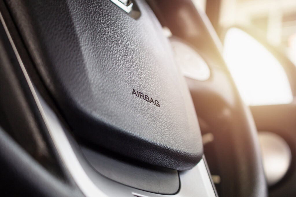 Safety airbag sign on car steering wheel